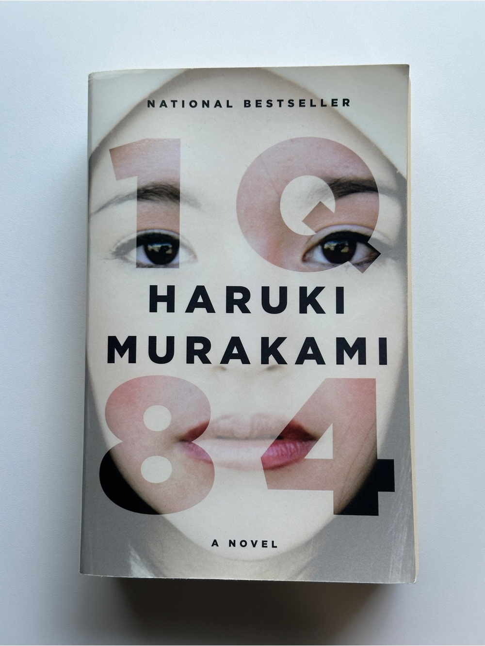 1Q84: A Novel by Haruki Murakami | Dystopian Fiction | Paperback Book